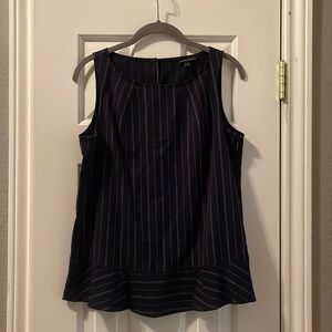 Navy sleeveless top with thin white stripes